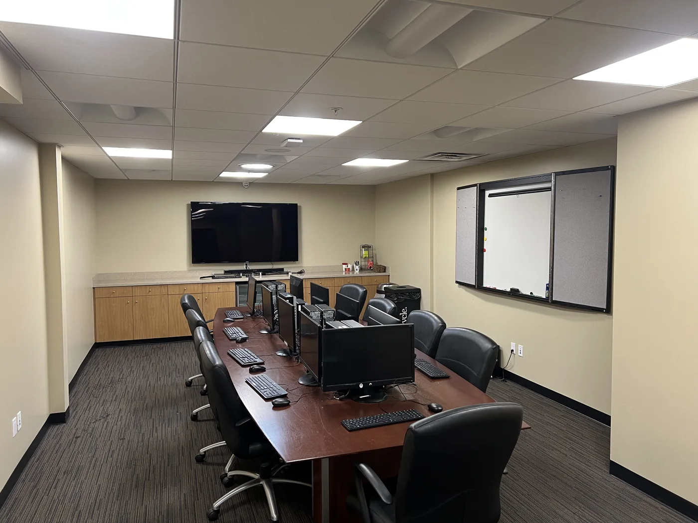 Conference room with workstation and display setup