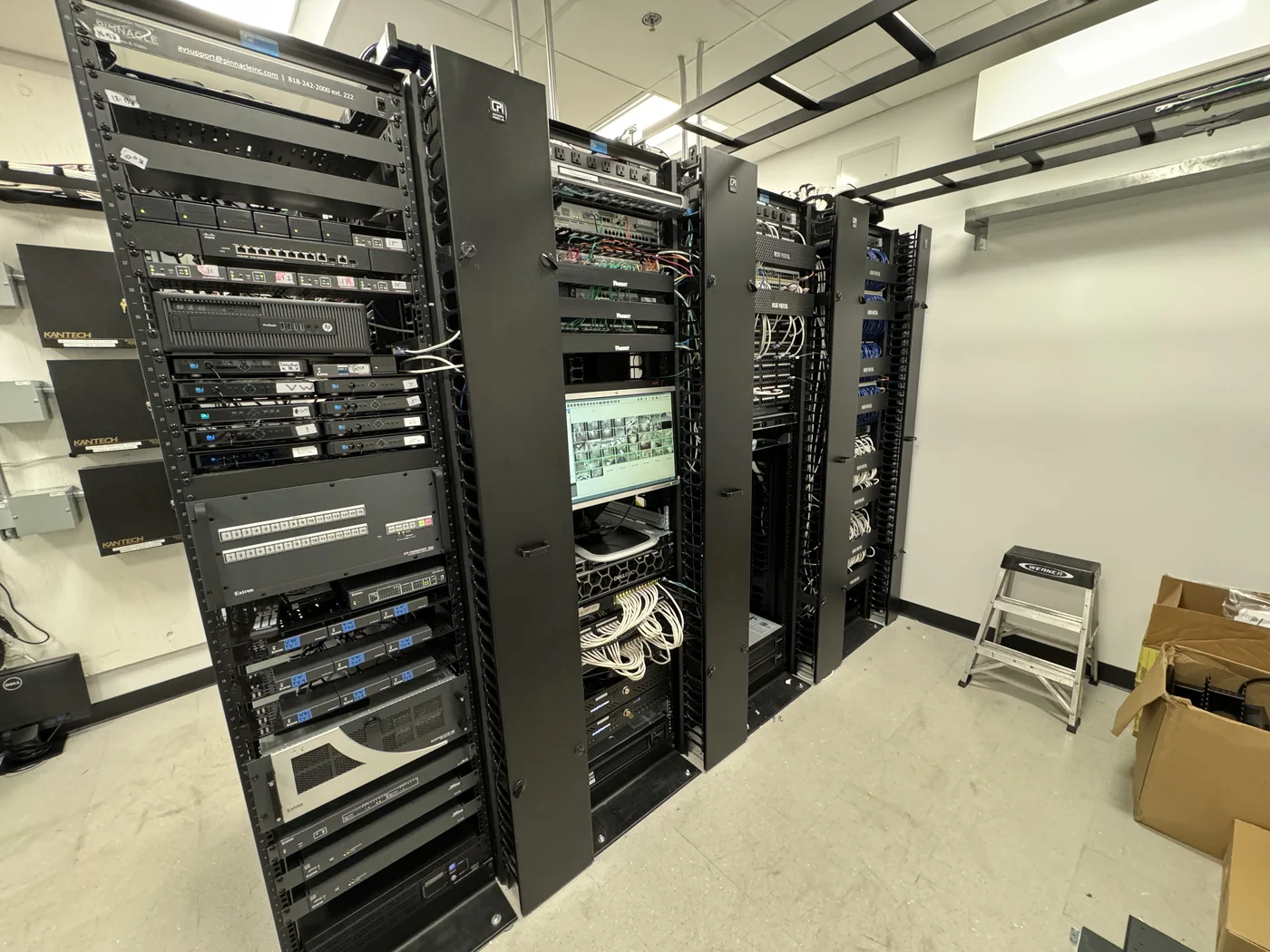 Infrastructure room with multiple equipment racks