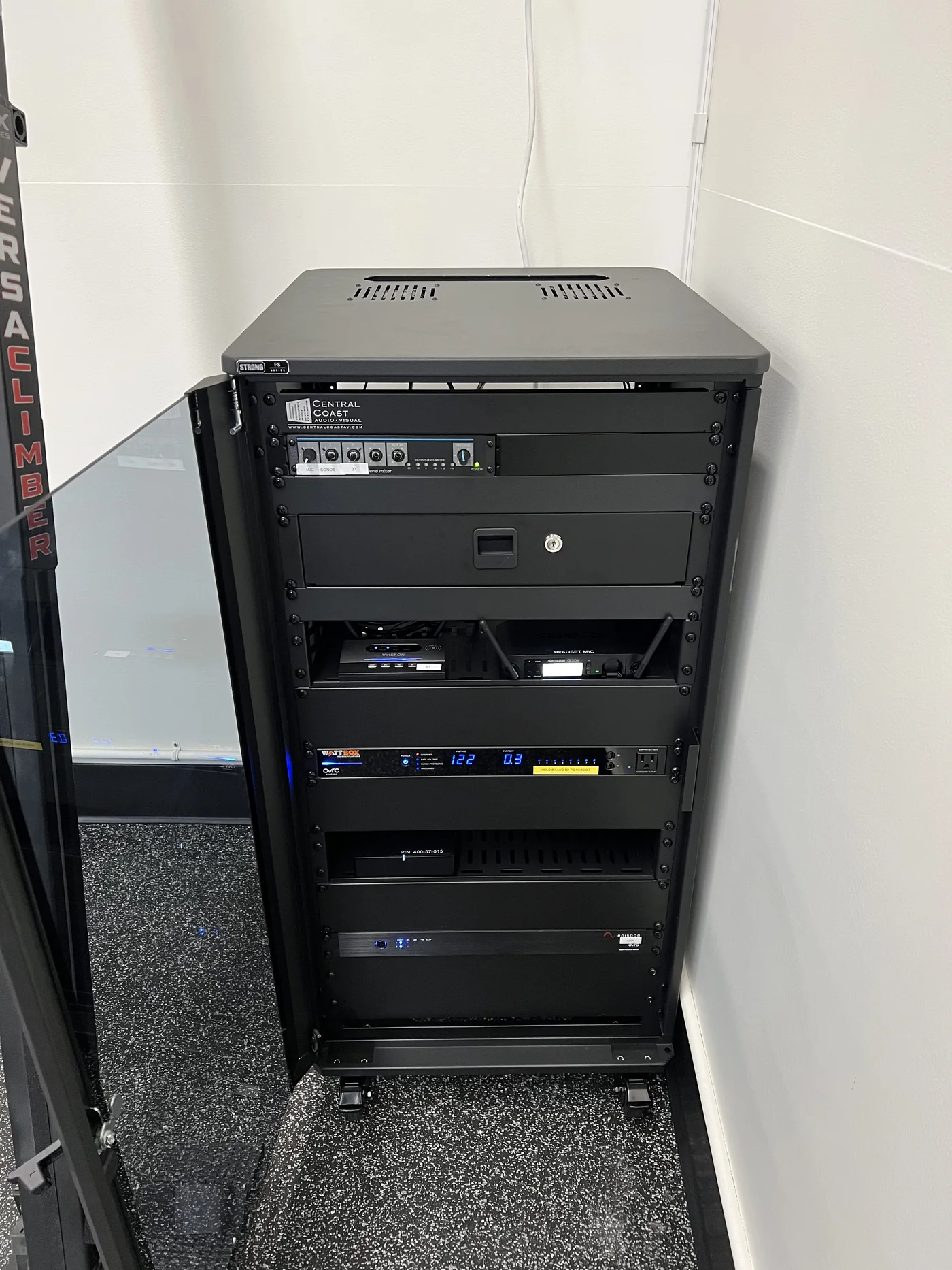 Finished media rack with rack-mounted hardware