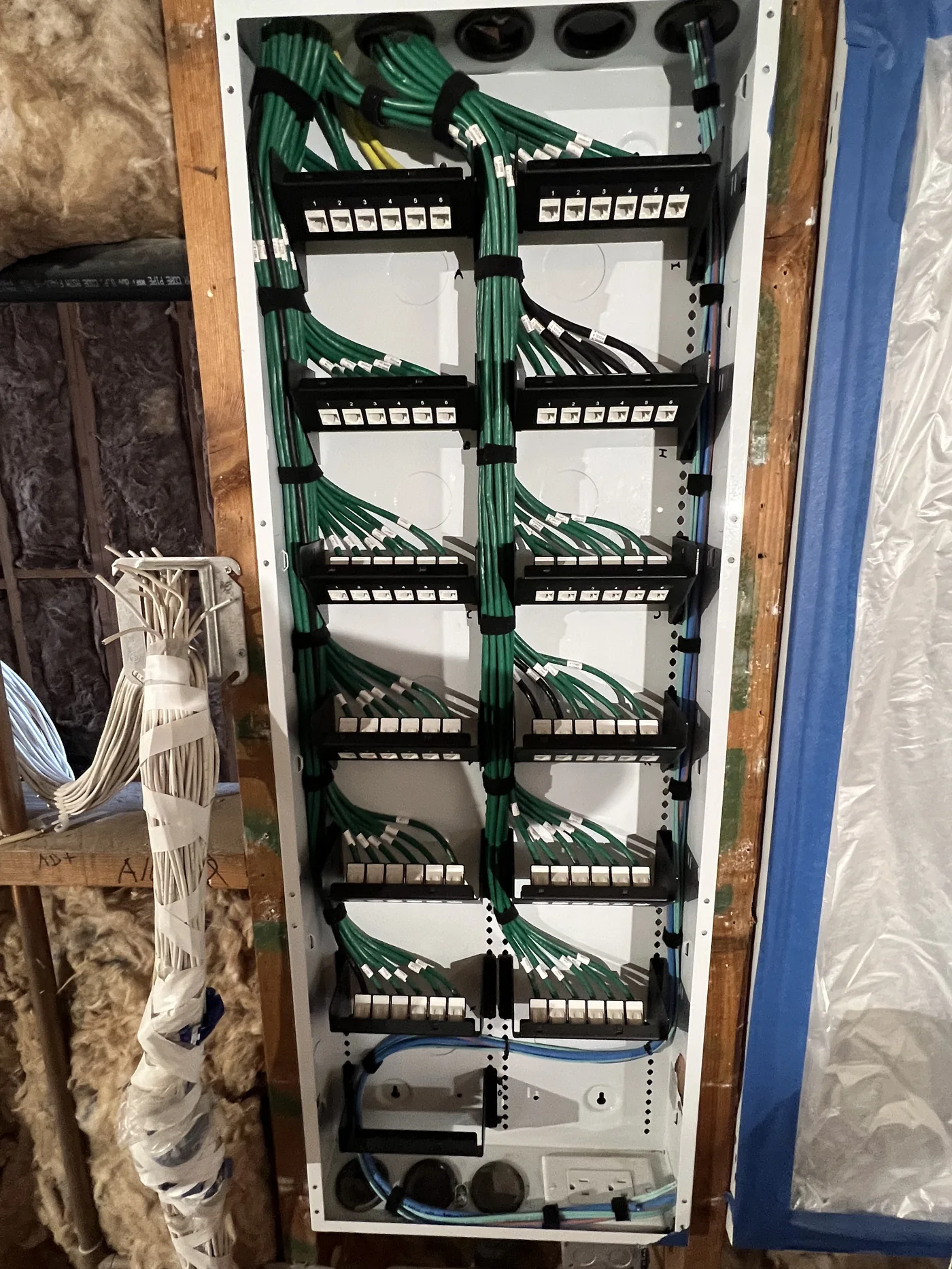 Low-voltage prewire service loops in wall framing