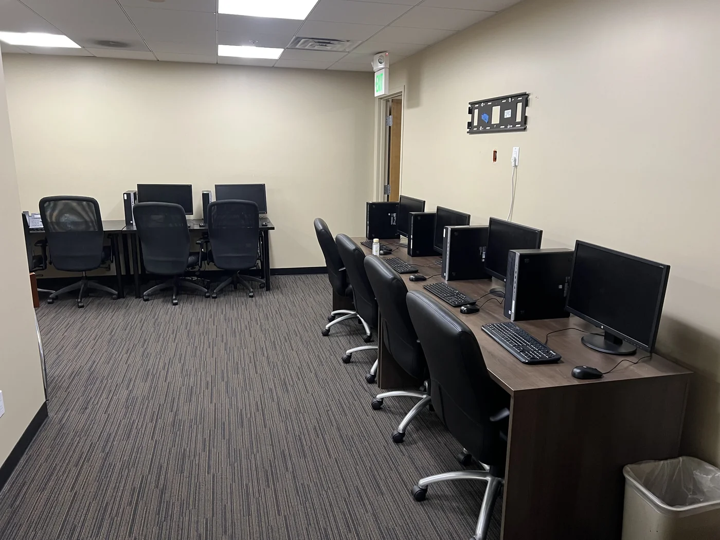 Training room with multiple desktop stations and displays